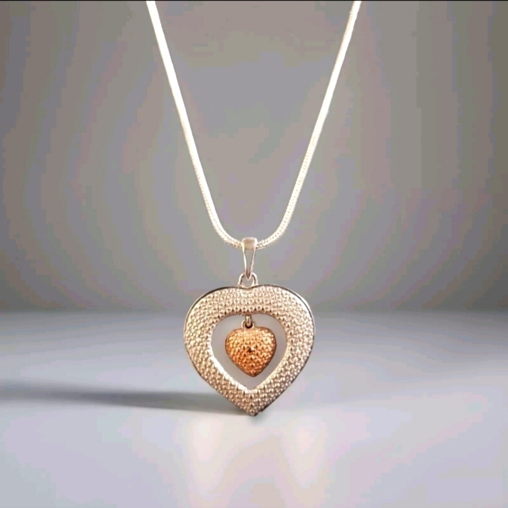 Platinum Plated Heart Pendant With Rhodium Plated Red Diamond Dancing HeartCharm
